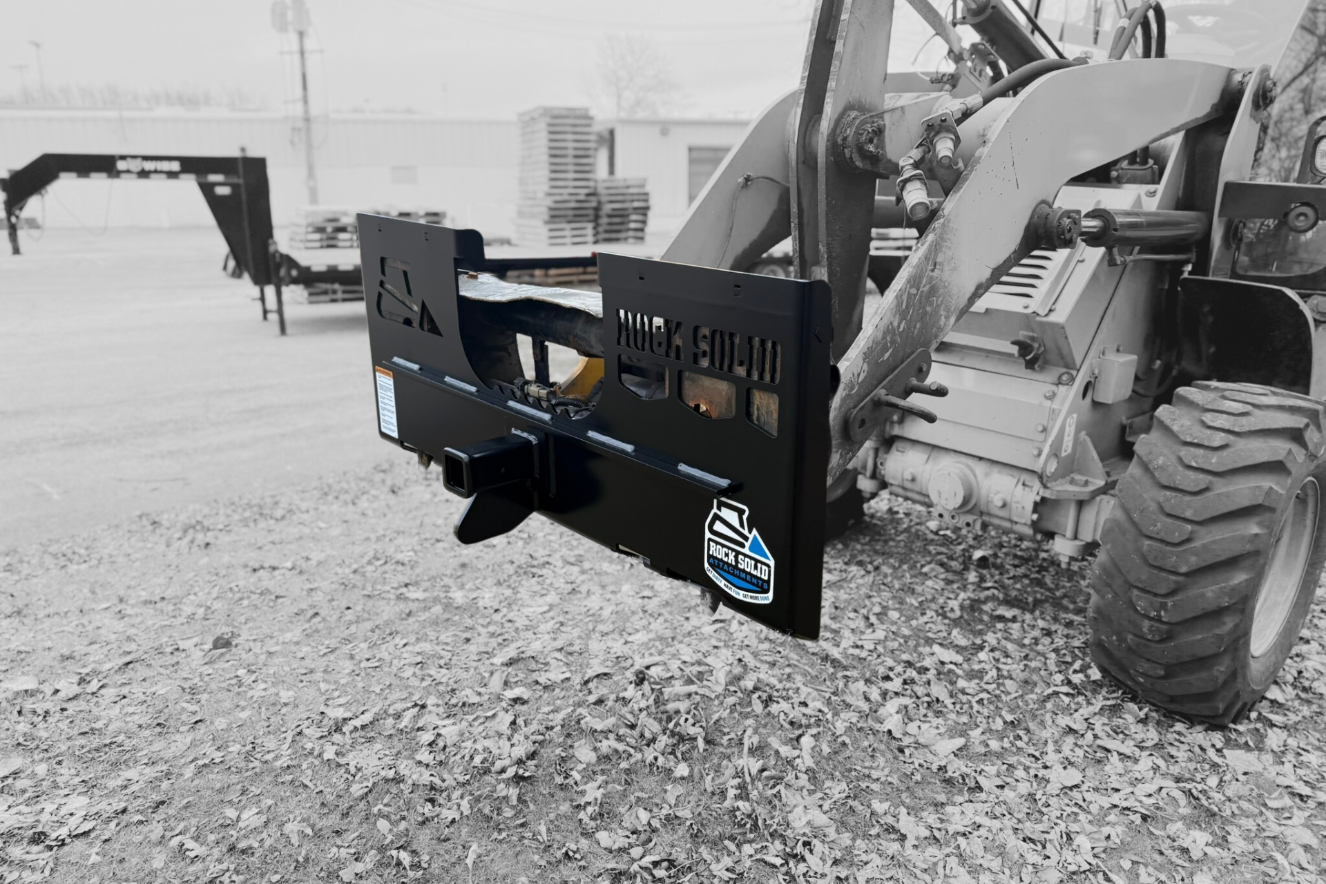 A black and white photo of a trailer mover