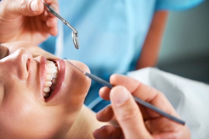 Logo for South Fork Dentistry with tooth and arrow.