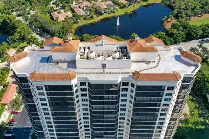 Commercial roof coating applied at Florencia Condominiums in Bonita Springs, Florida
