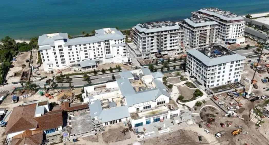 Roofing work across the Naples Beach Club high-end coastal development in Collier County, Florida