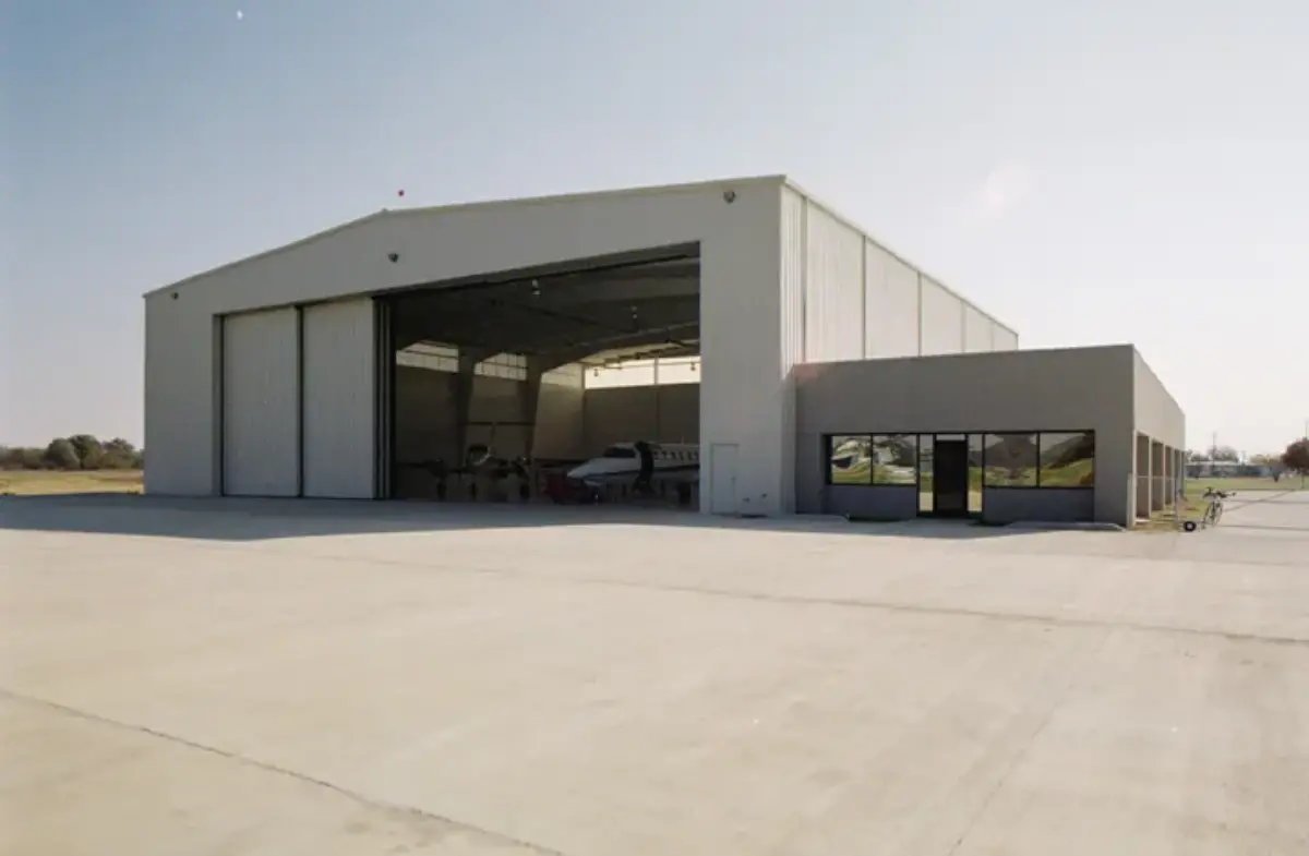 A large building with a plane inside of it