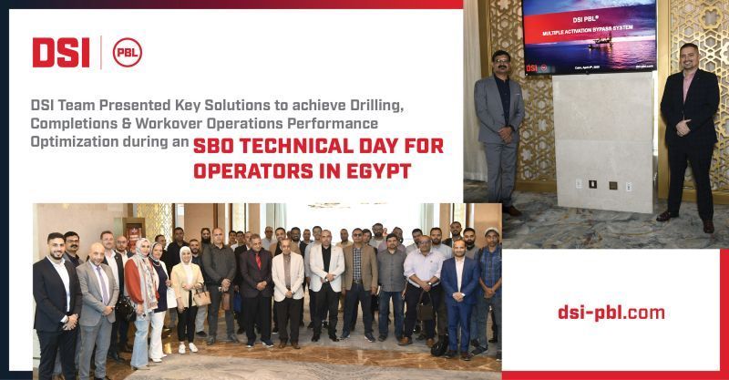 A group of people are posing for a picture in front of a screen that says technical day for operators in egypt