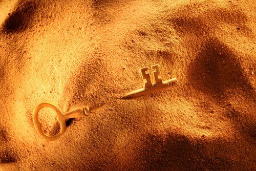 Key bured in the sand
