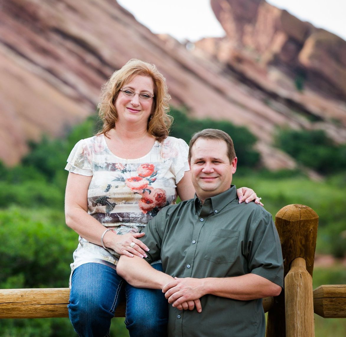 image of Lori and her husband standing on the shoreline