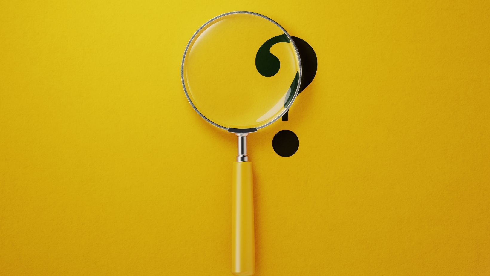 Magnifying glass over a question mark, representing how research is a search for answers. 