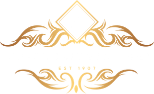 Logo for Kungl Funeral Home, featuring a gold decorative border, the letter K, and the text "EST 1907".