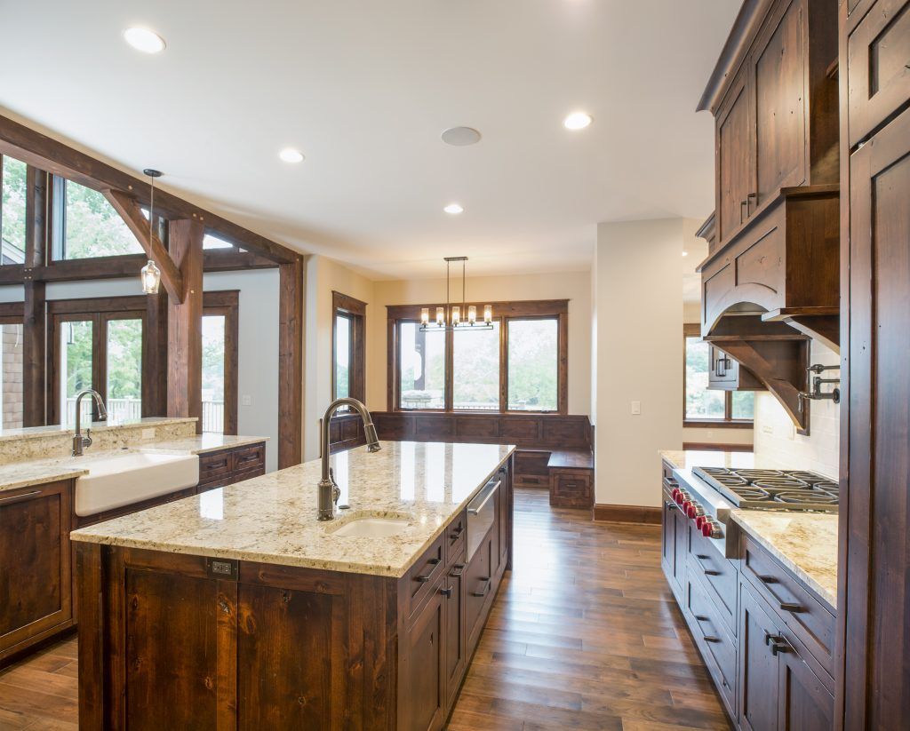 There is a large island in the middle of the kitchen.