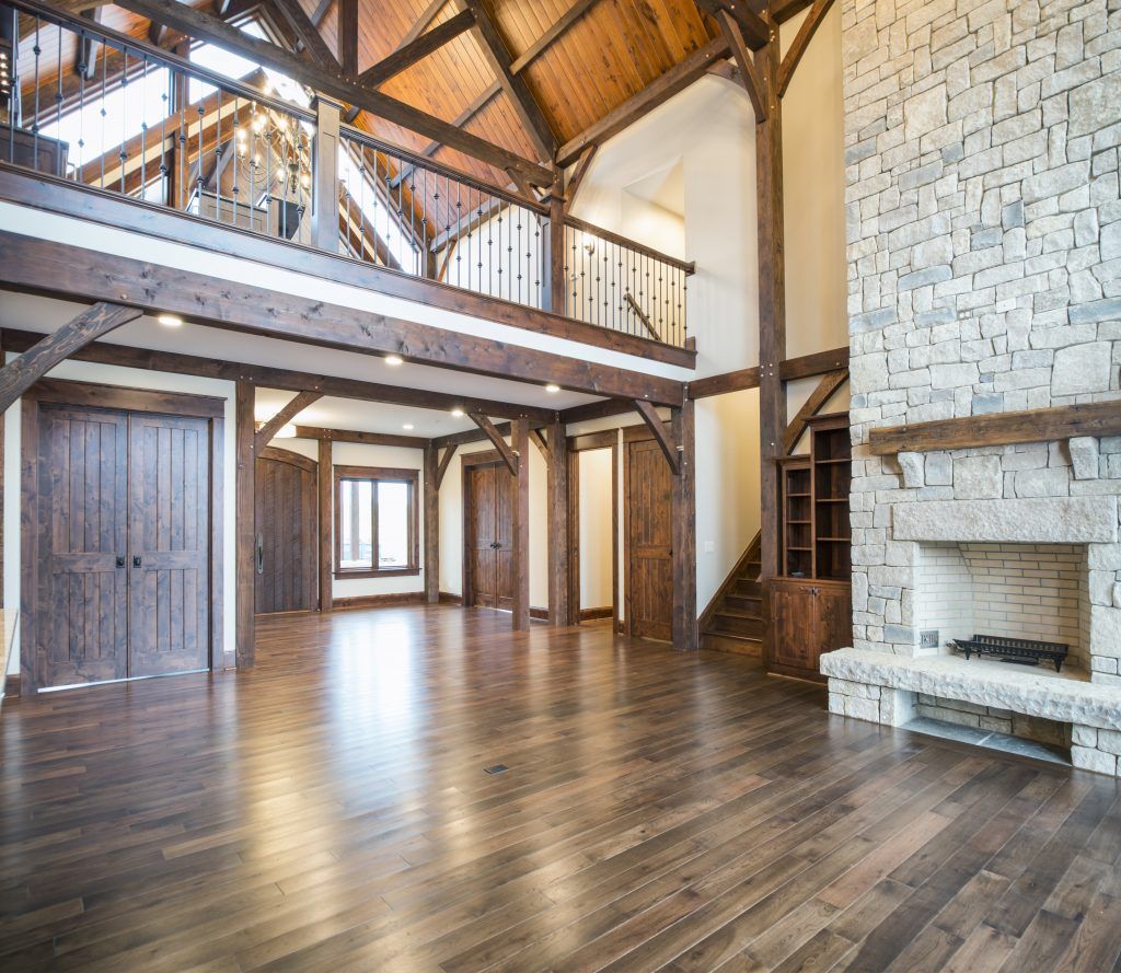 There is a fireplace in the middle of the room.