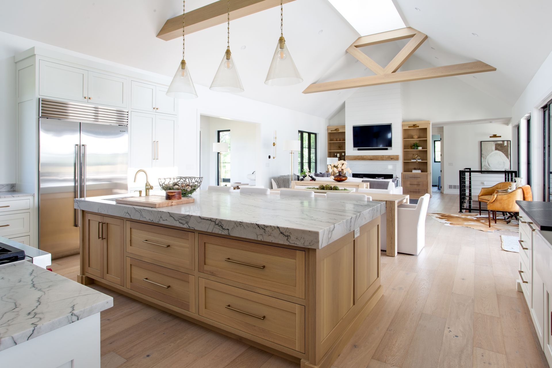 There is a large island in the middle of the kitchen.