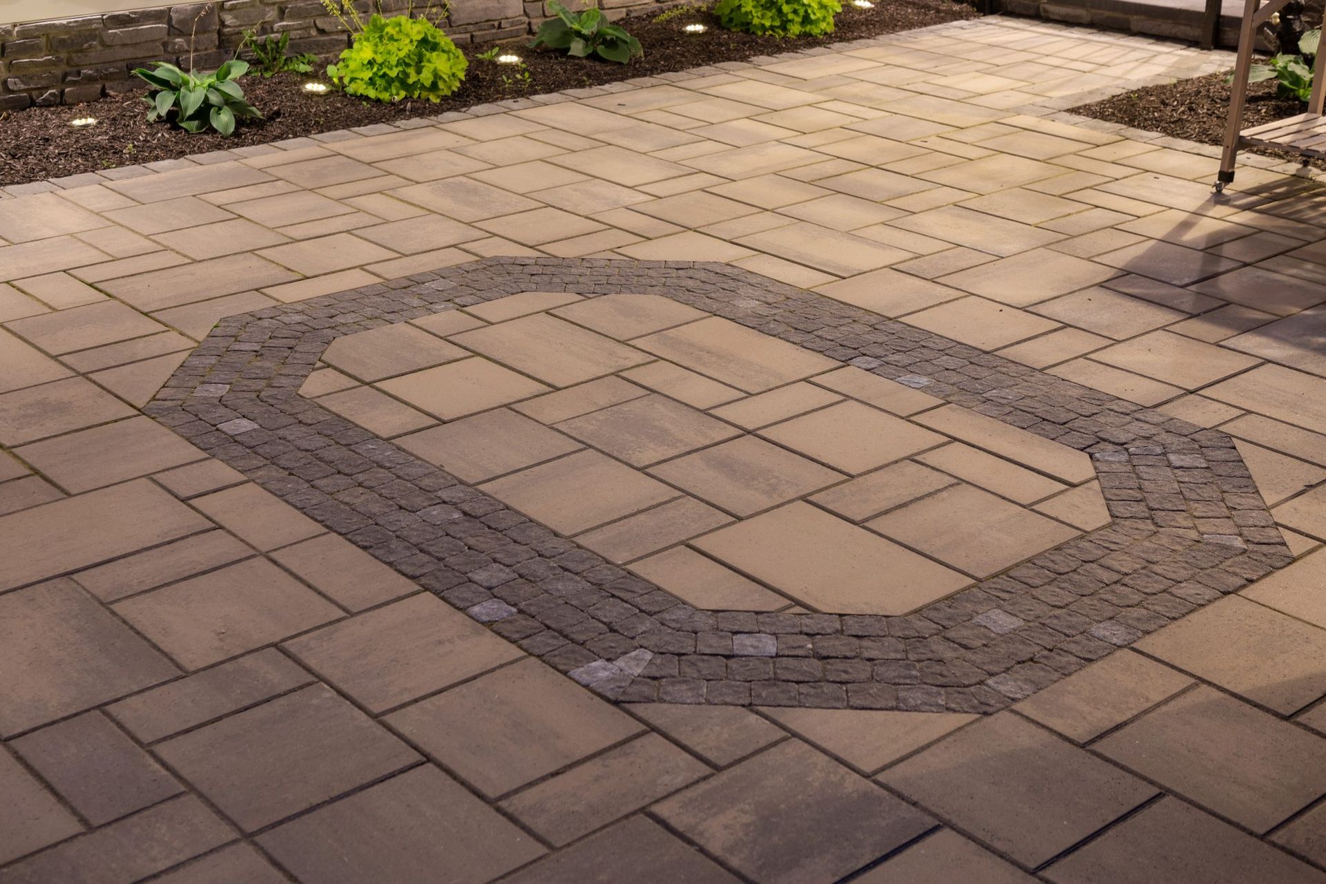 A patio with a circle in the middle of it