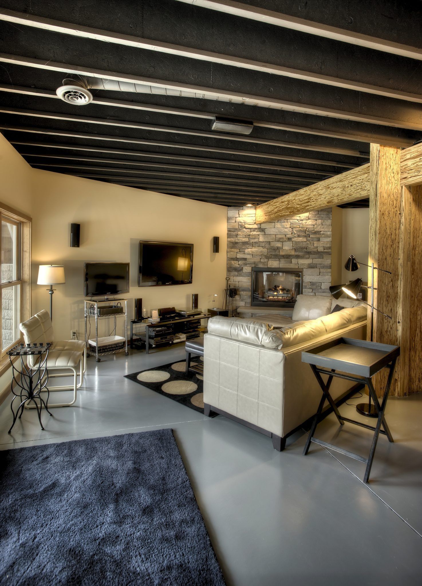 A living room with a couch and a television