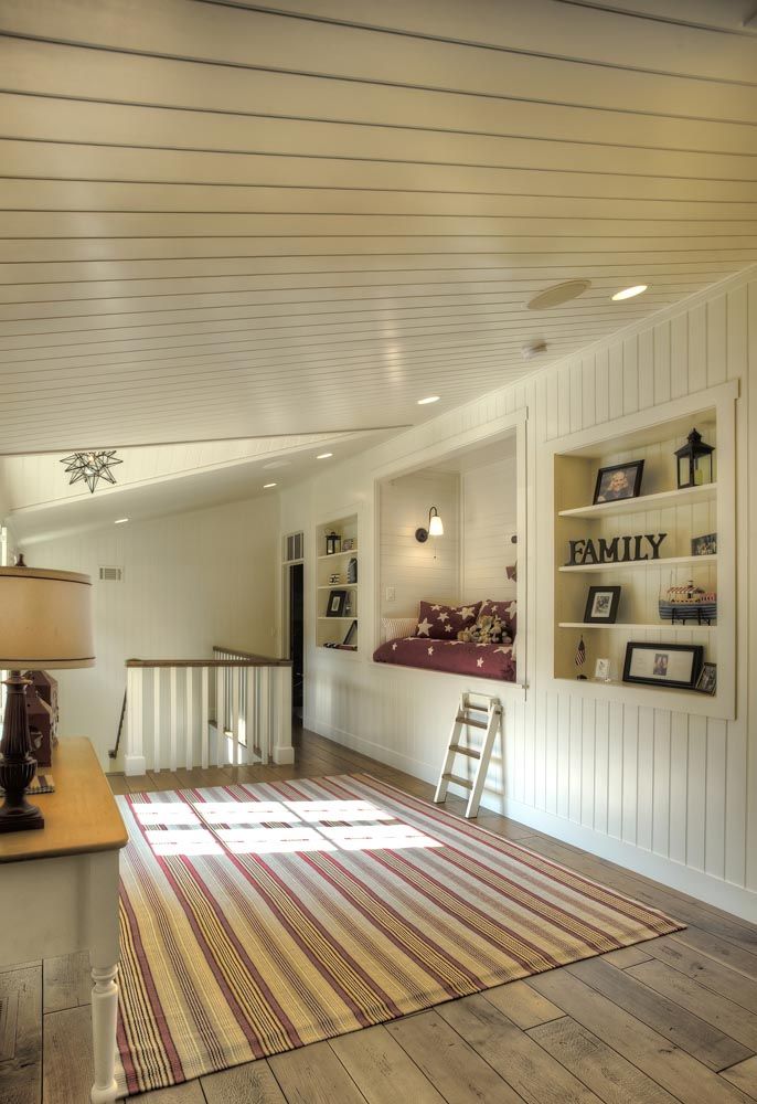 A living room with a rug and a sign that says family
