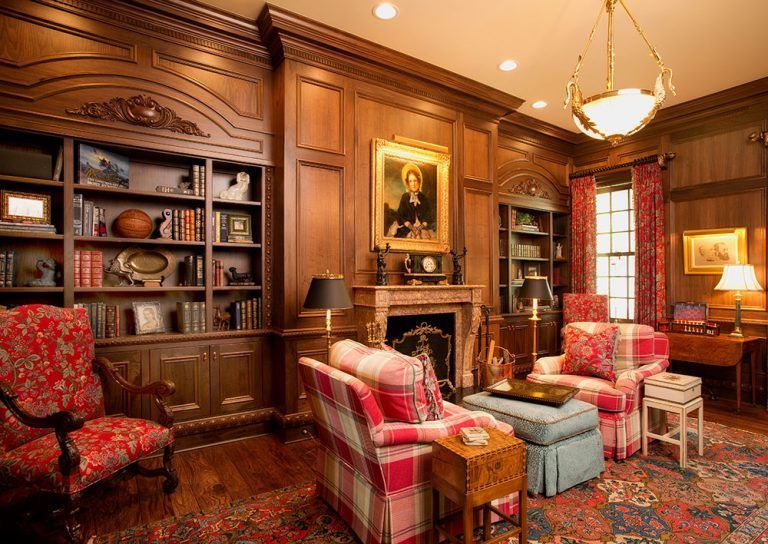 A living room filled with furniture and a fireplace.