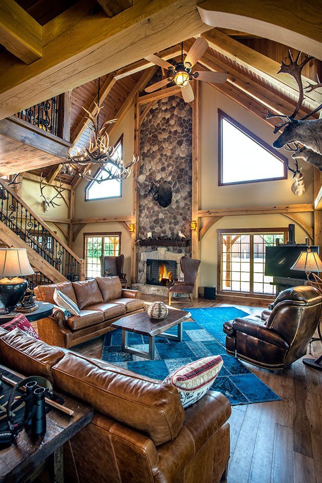 A living room filled with furniture and a fireplace.