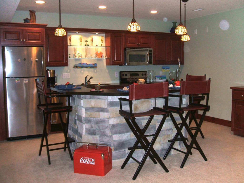 A kitchen with a coca cola box on the counter
