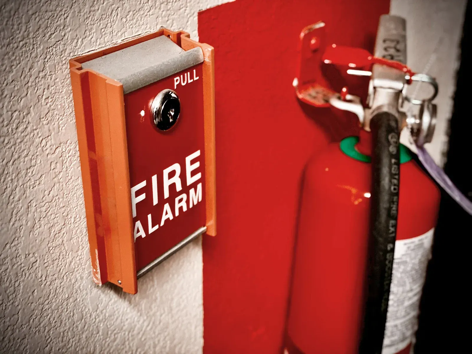 Orange fire alarm box with 