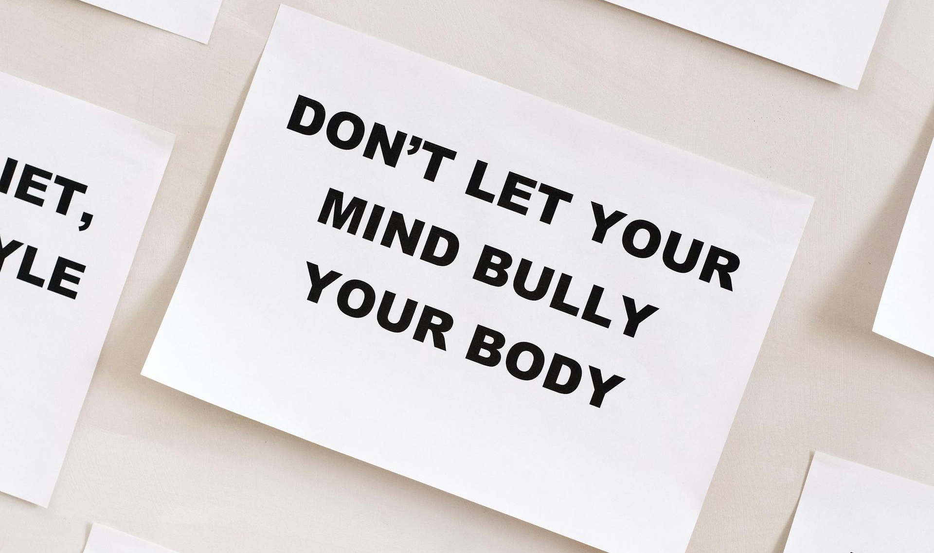 Sticky note that says dont let your mind bully your body