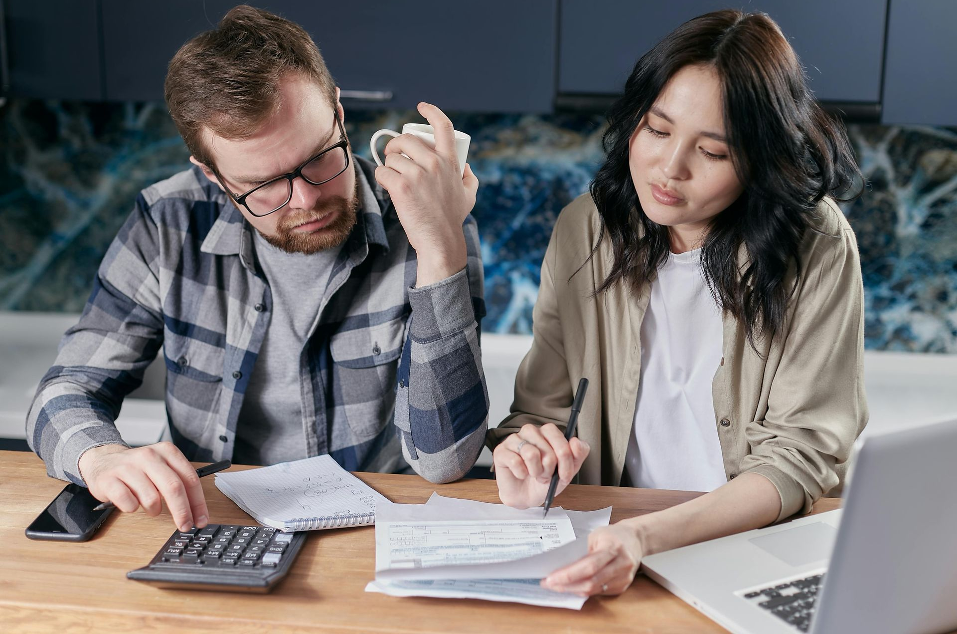 Couple looking at their budget