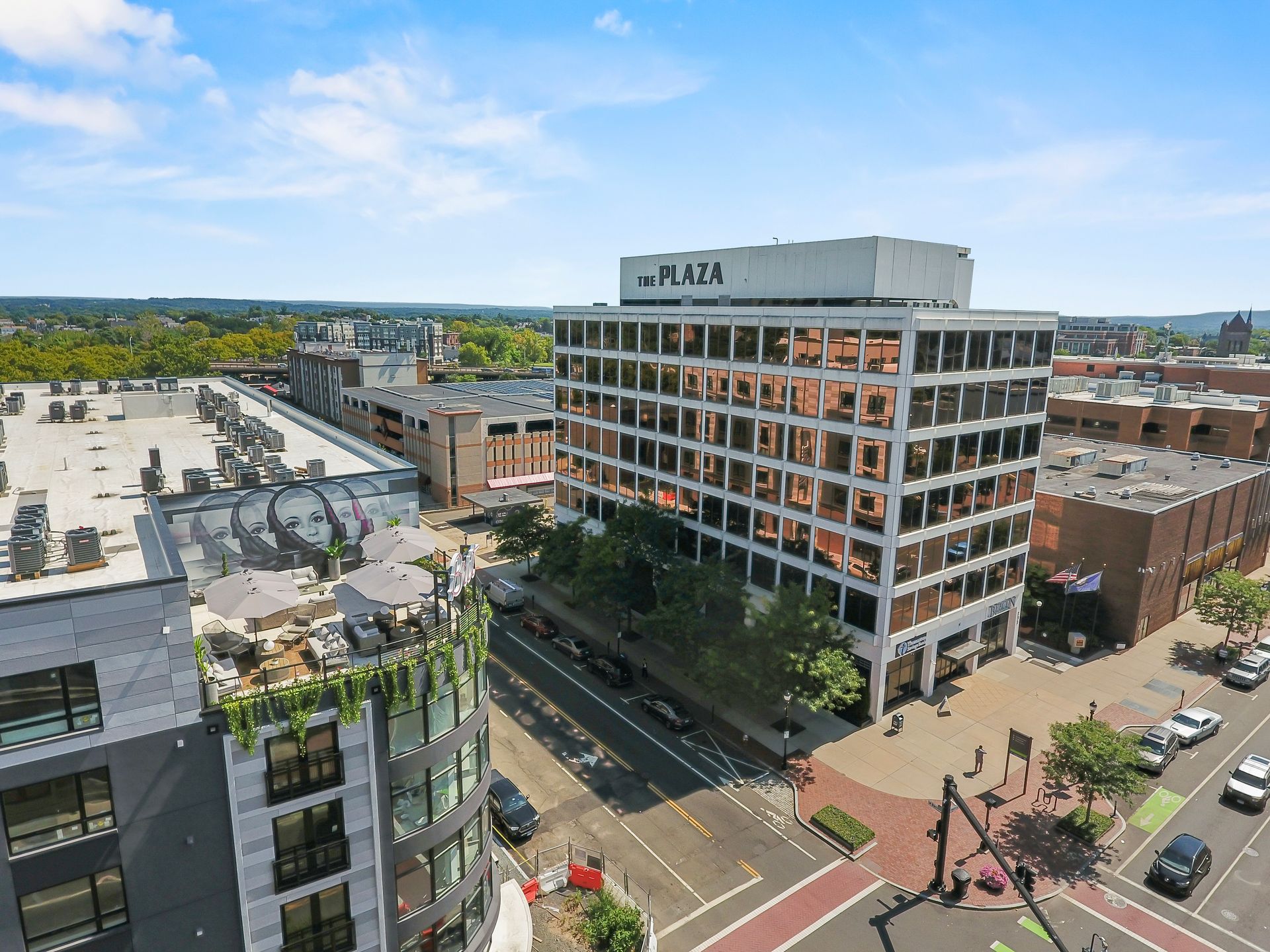 Aerial view of a city street with office buildings.