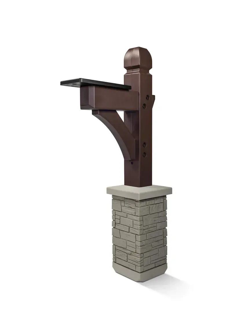 Brown mailbox on a brick pedestal with a raised side arm, isolated on a white background