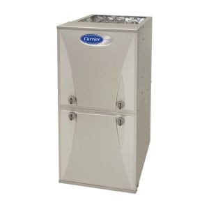 Carrier brand, beige-colored furnace unit with two access panels, blue oval logo.