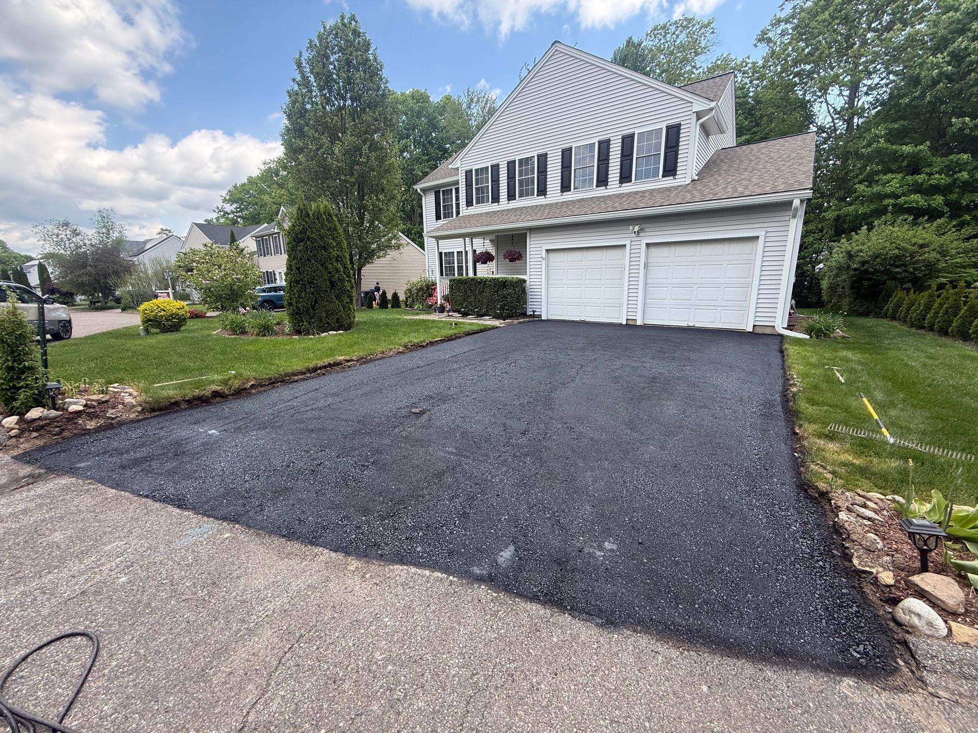 Driveway after removal and sealcoat 