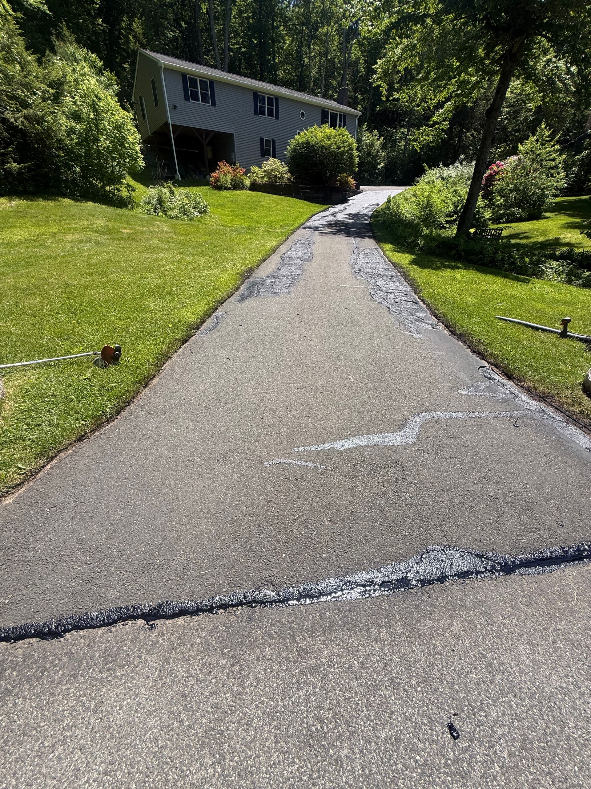 Driveway after crack repairs are completed