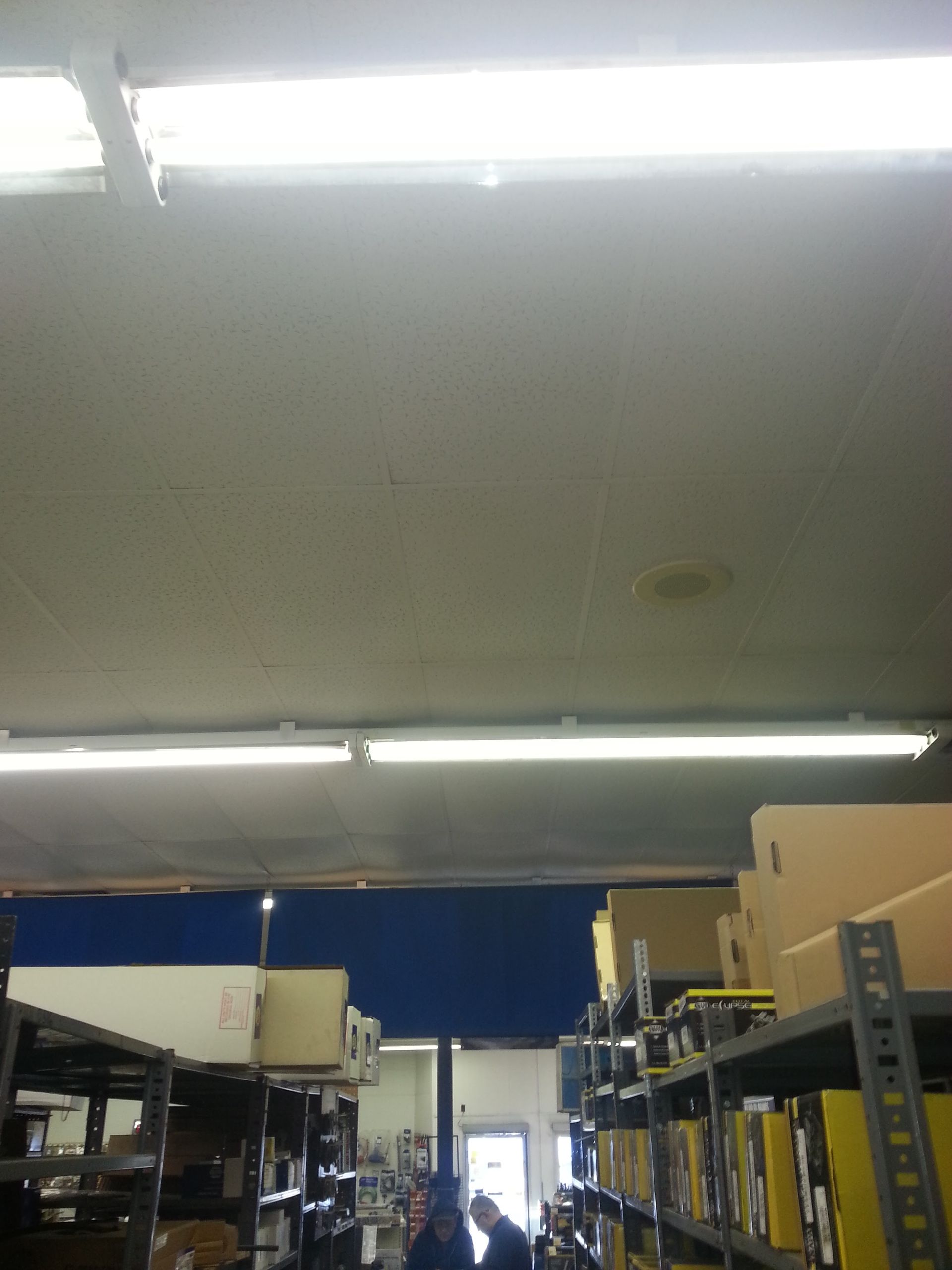 bright fluorescent ceiling lights.
