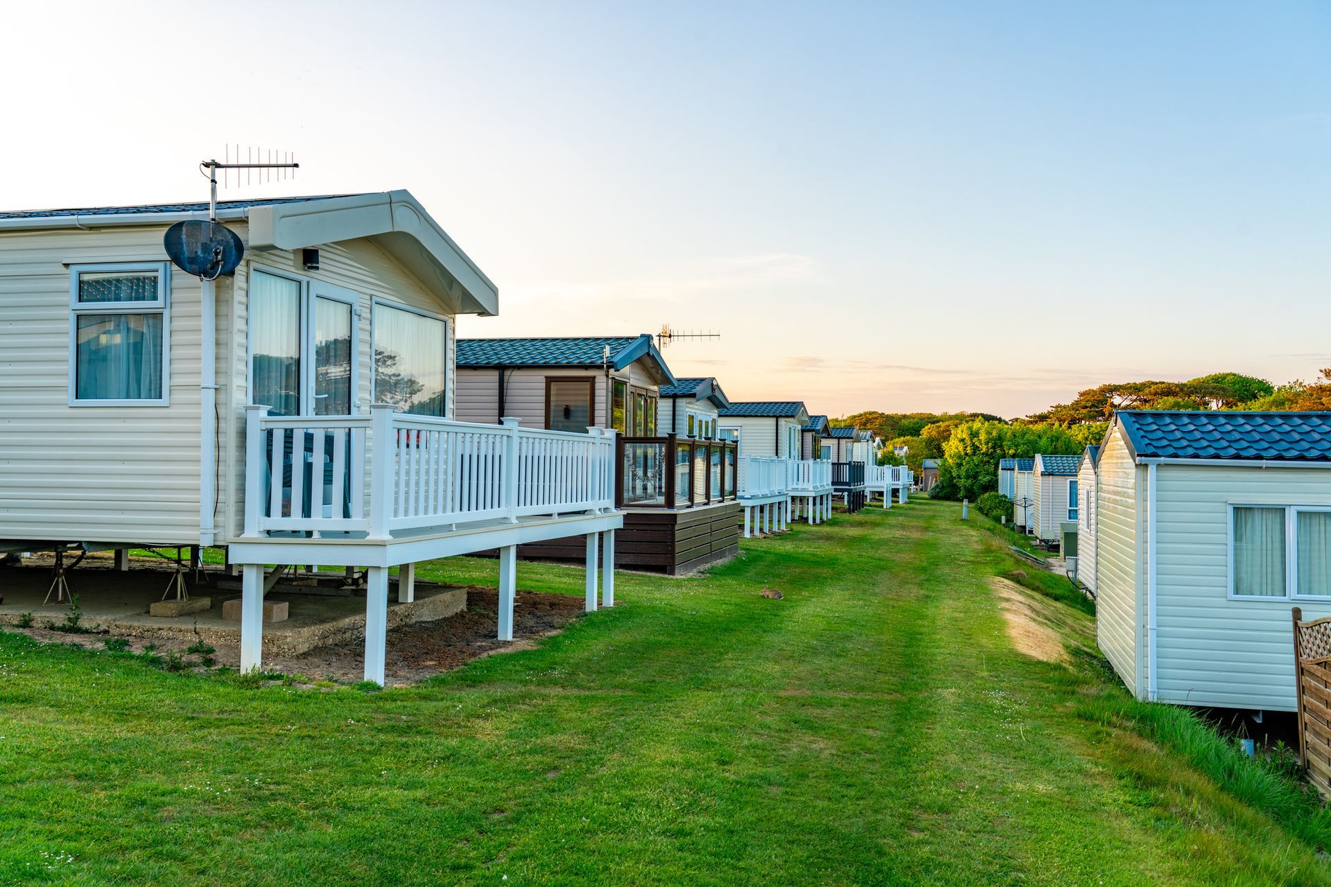 Modern caravan homes inviting tourists for relaxing vacations.