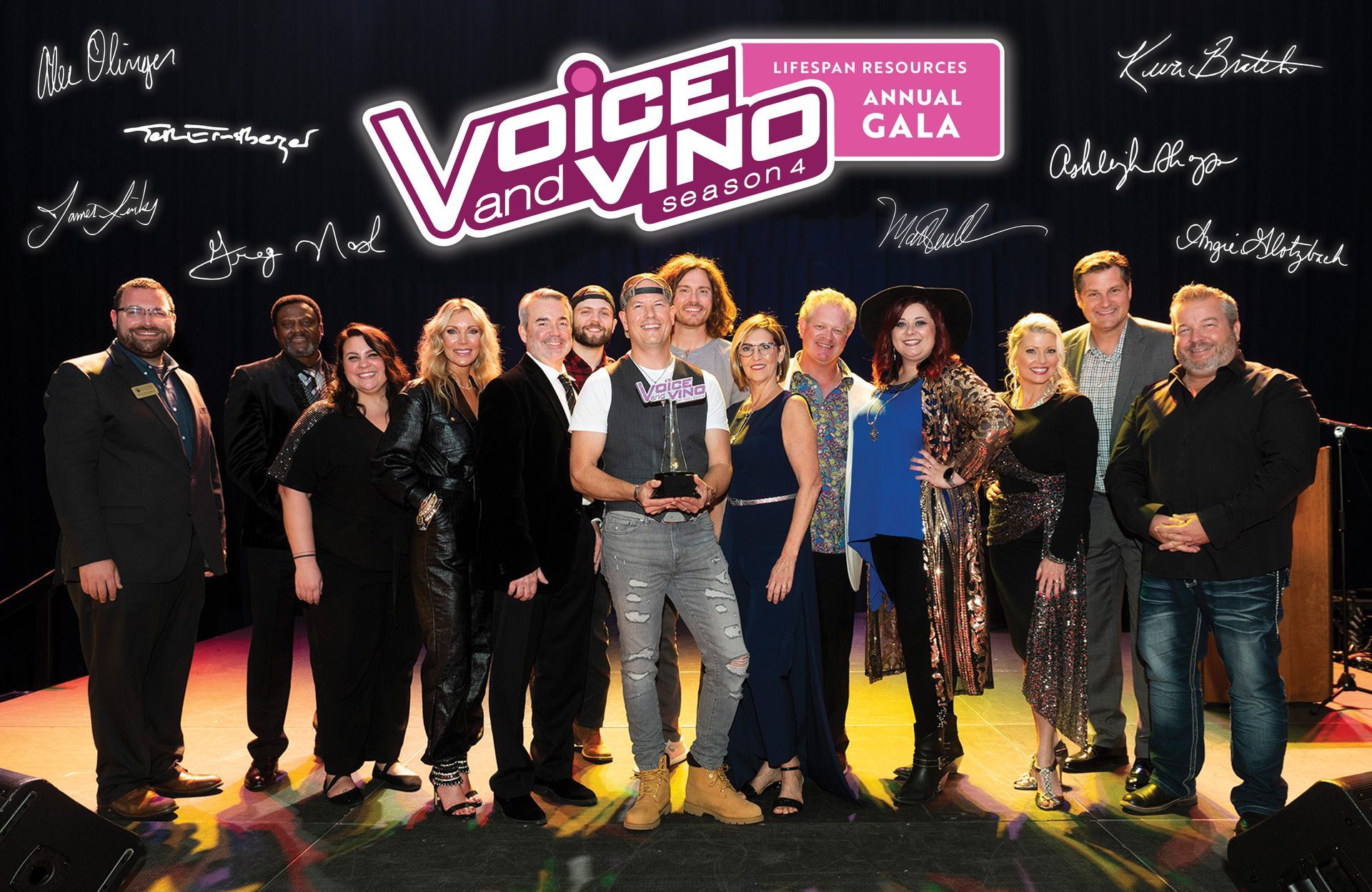 Group of people posing with a logo that says