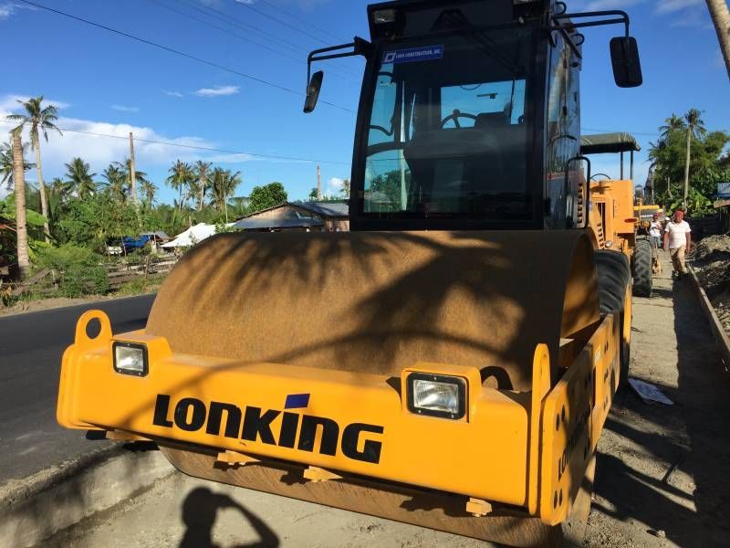 Row of Vibranium yellow crawler excavators ready for construction rental in Dubai UAE