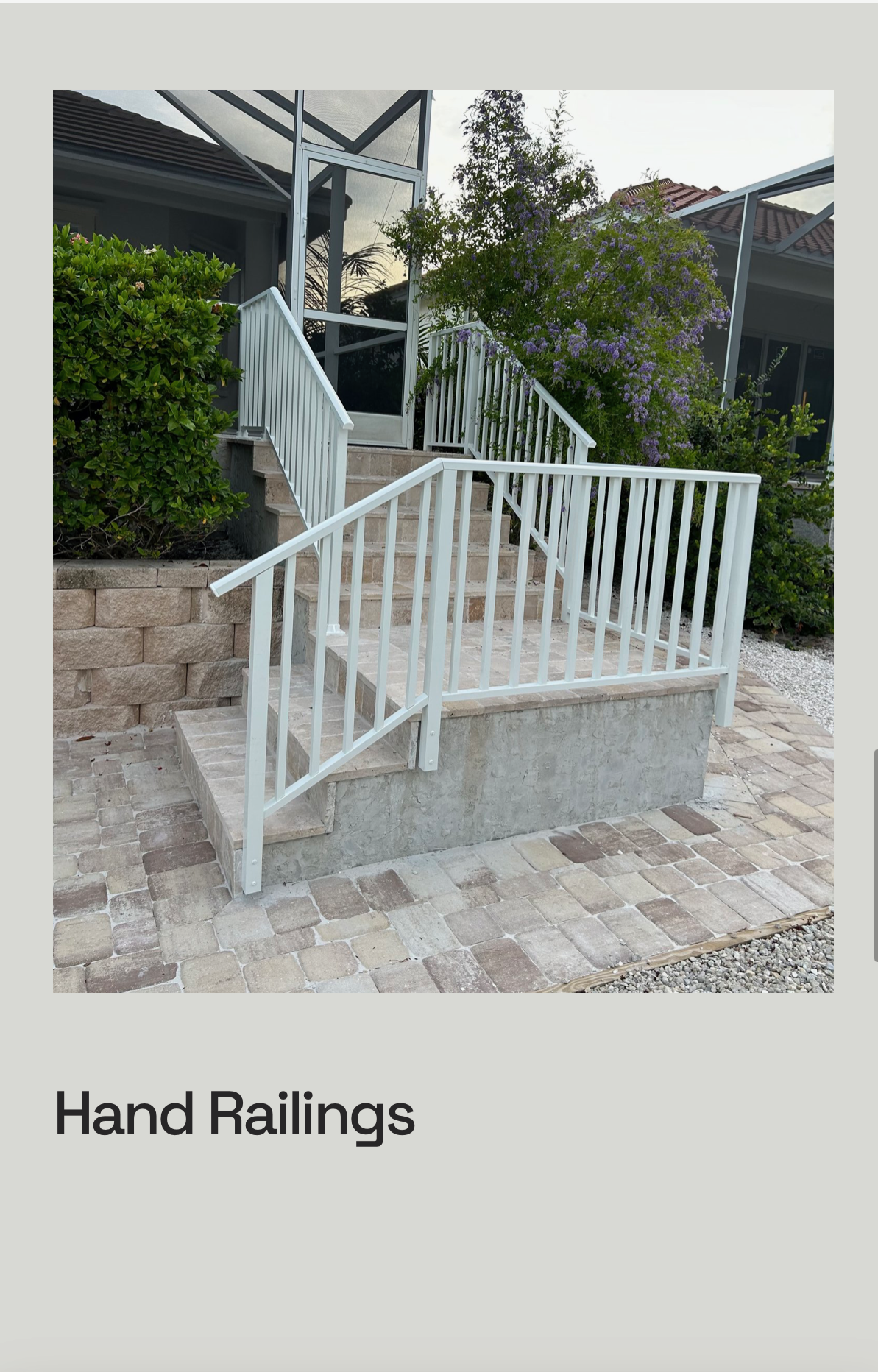 A picture of a white railing on a set of stairs.