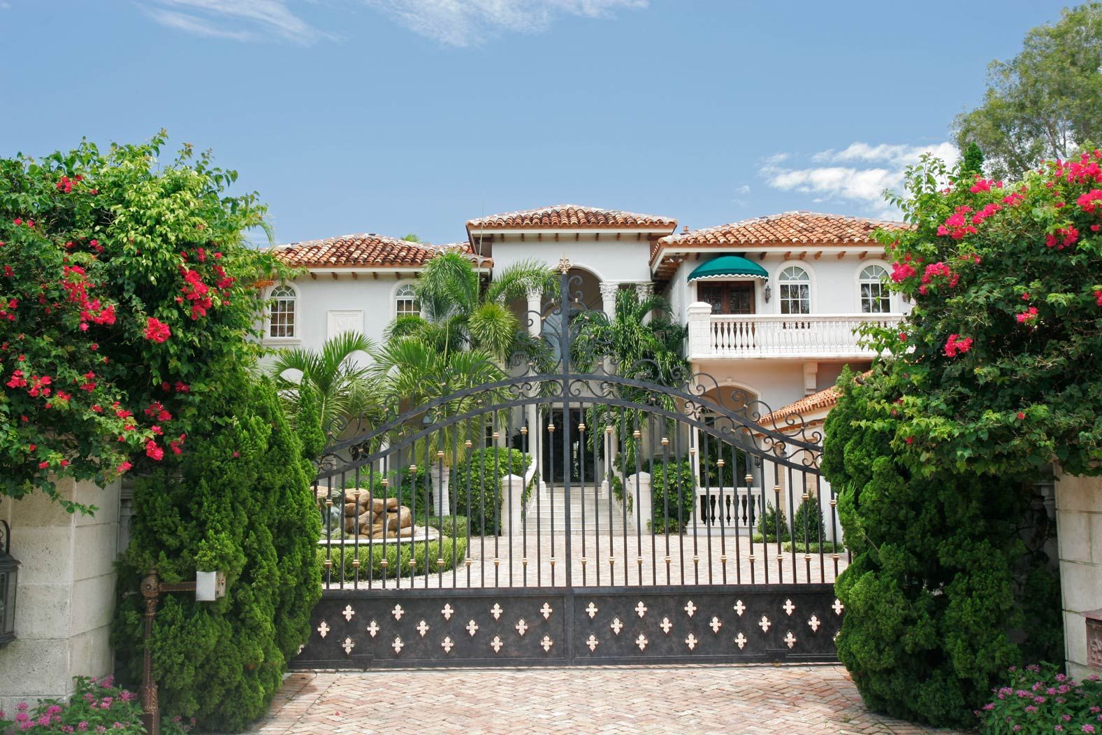 Residential wrought iron gate showcasing security gate installation in Gilroy, CA, combining elegance and safety. Residential wrought iron gate showcasing security gate installation in Gilroy, CA, combining elegance and safety.