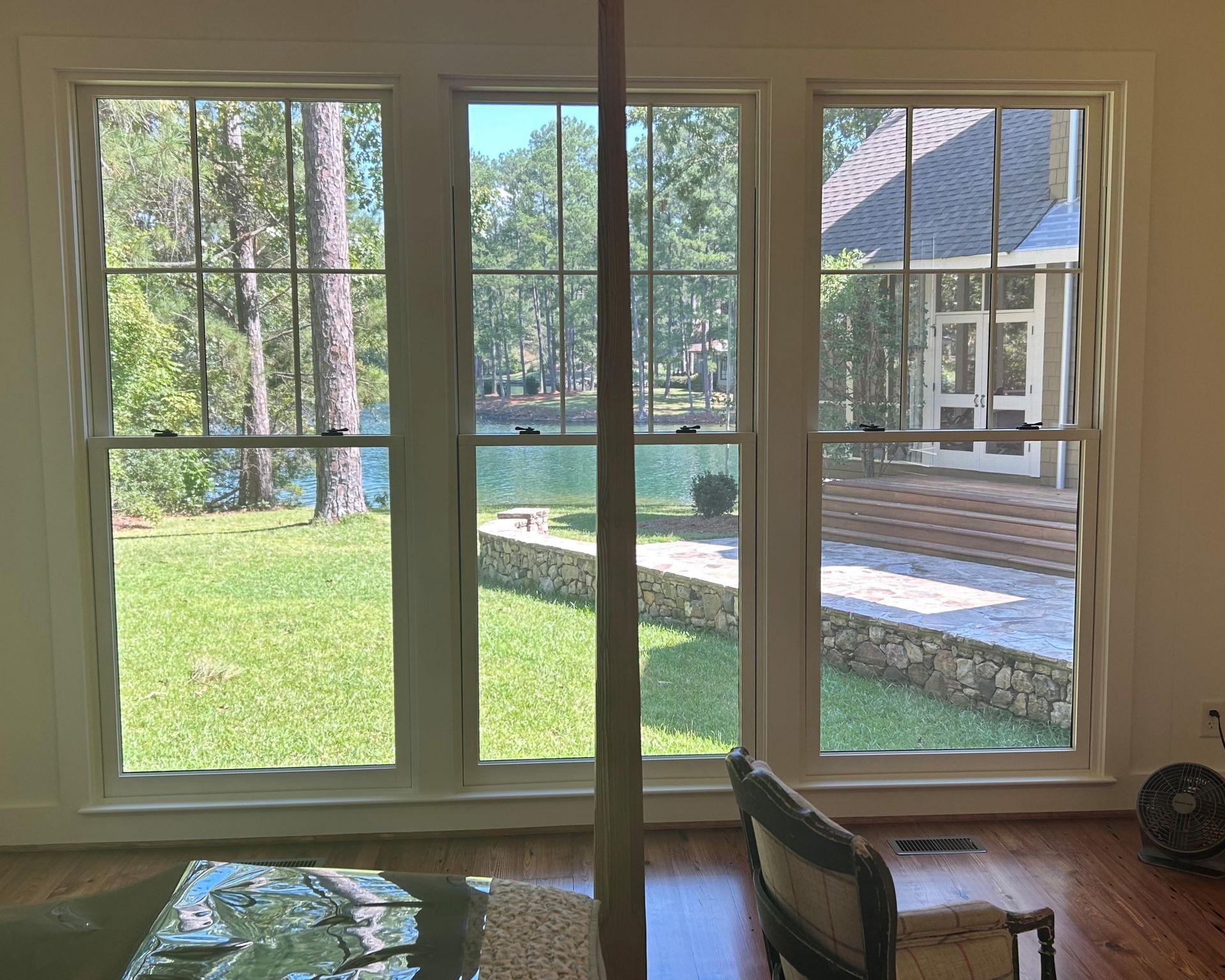 Bright Sun with UV-Radiation poured inside these Lake Martin home windows causing bright glare and Sun-fading before SPF Tinting services in Eclectic AL