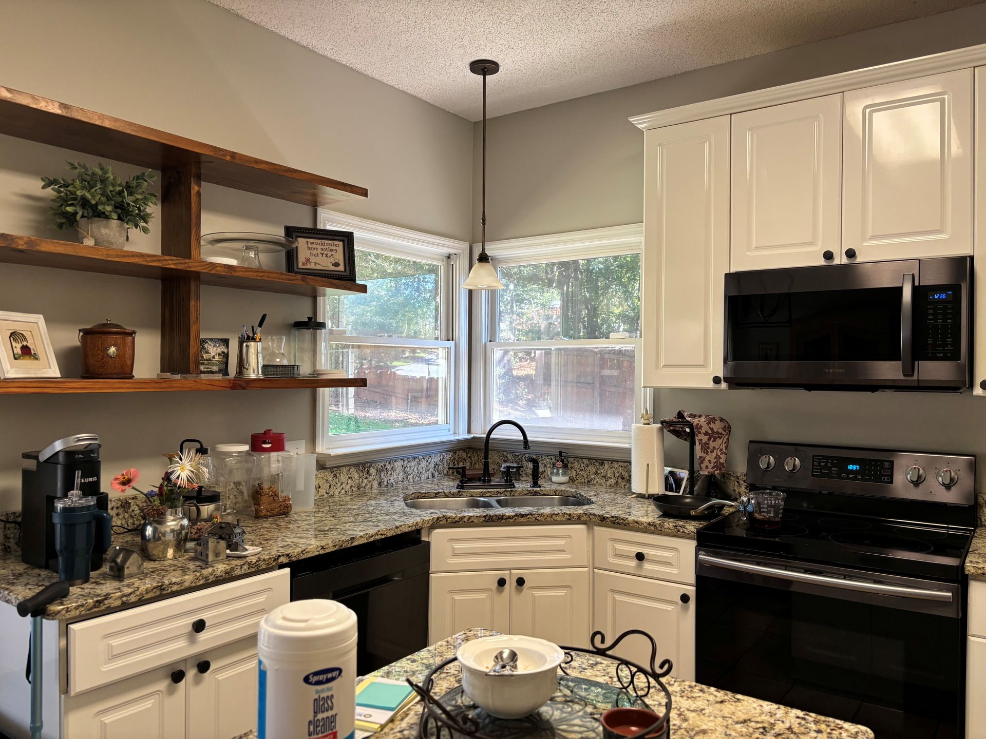 SPF Dimmed Crystal home tint stops uv Sun with heat flooding inside kitchen windows. Auburn, AL