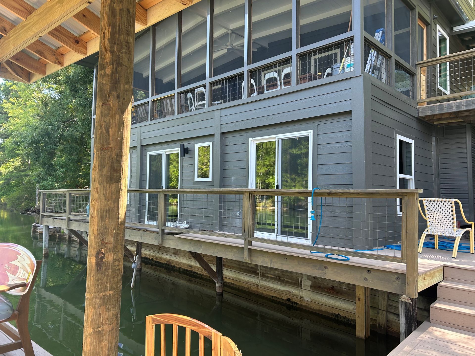 SPF Dim' Crystal home tint blocks the most heat gain for a semi-transparent exterior look. Lake Martin. Eclectic, AL