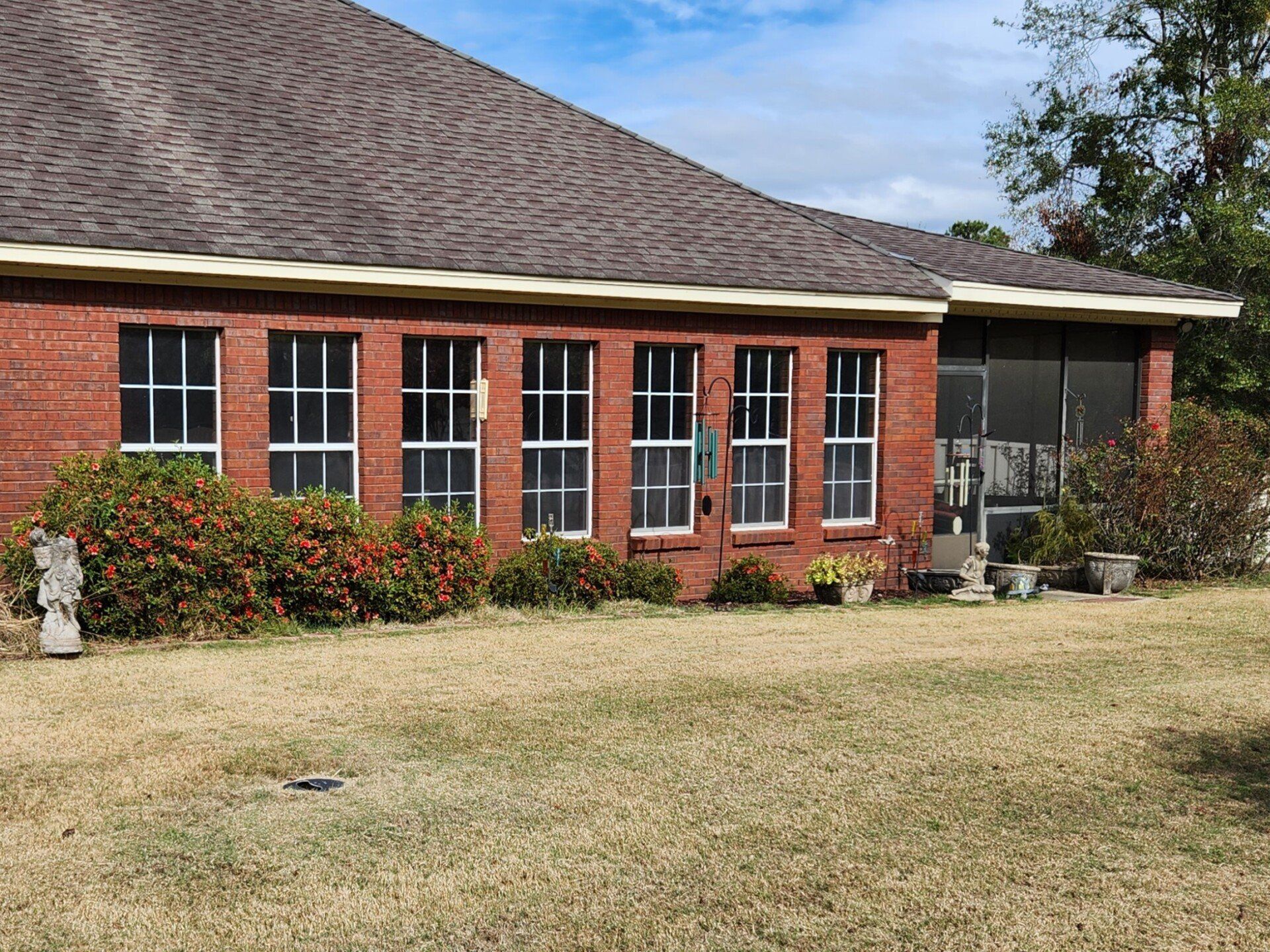 best home window tinting service in Millbrook AL - Solar Heat along with UV Sun glare pounded through blinds of these home Sunroom windows in Millbrook, AL
