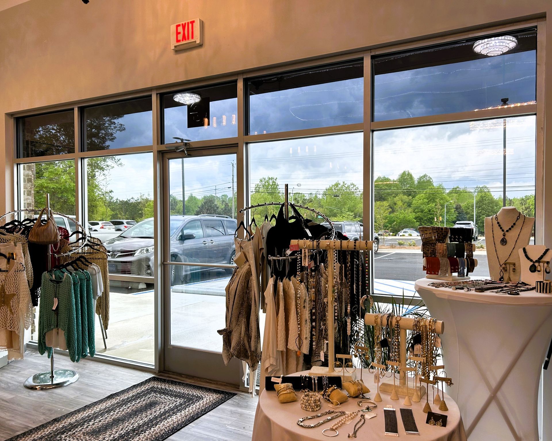 storefront window tinting - SPF Tint blocks the most heat gain also bright glare while ending UV Sun damage inside LA Salon studio windows in Opelika, AL