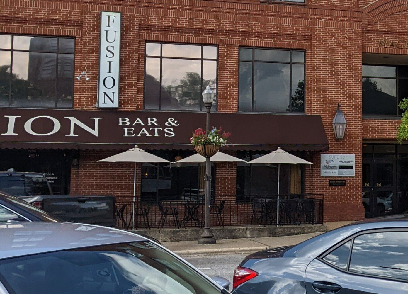 SPF Energy Efficient Office Tint installed to building windows blocking Solar heat with UV Sun-fading in downtown Auburn AL