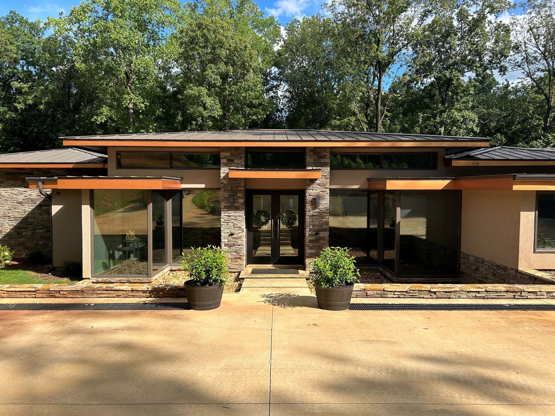 Residential tinting Auburn AL - SPF Dimmed Crystal Tint blocks most heat with bright Sun glare blasting in home windows while keeping visibility looking in. Auburn, AL
