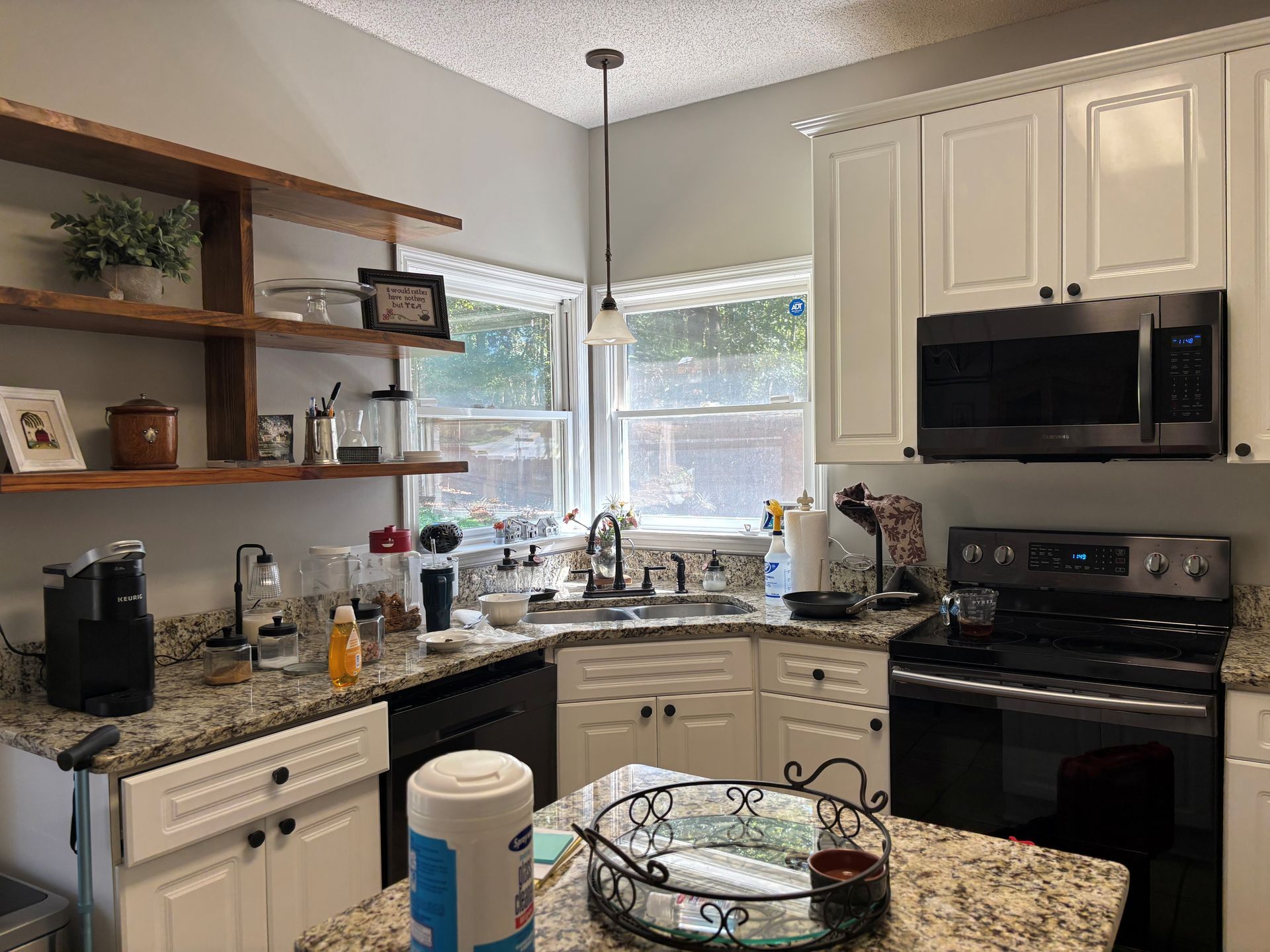 residential window tinting in Auburn - home tinting stops uv Sun with heat flooding inside east facing kitchen windows. Auburn AL