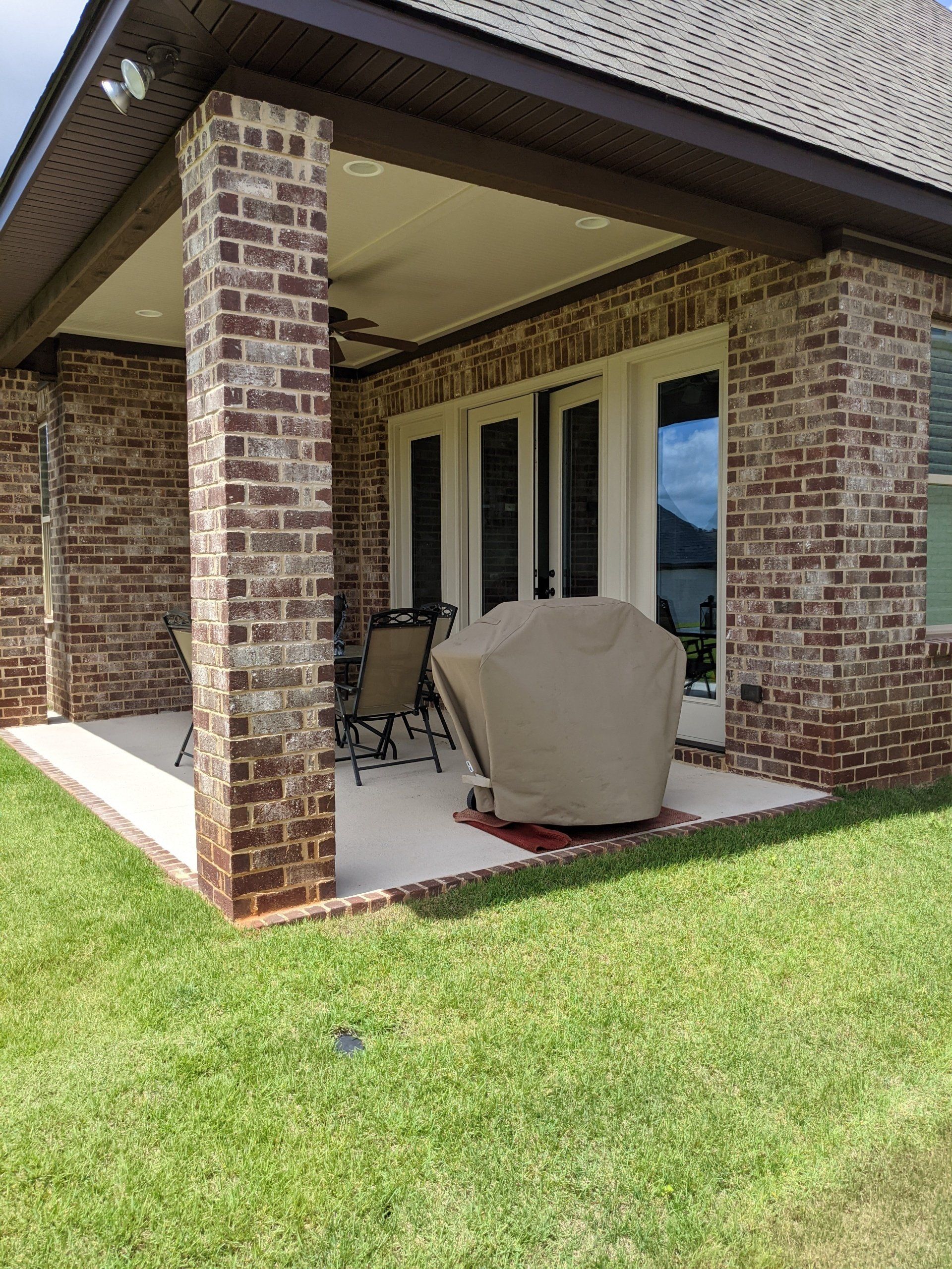 tint home windows in Auburn, AL - This home's patio doors were letting in too much heat with bright Sun glare. Before SPF residential tint fixed the home environment in Auburn, AL