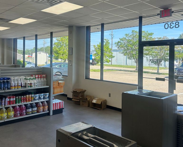 best window tinting in Montgomery AL - before tint. Afternoon Sun caused a five-degree gap limiting space inside storefront windows.