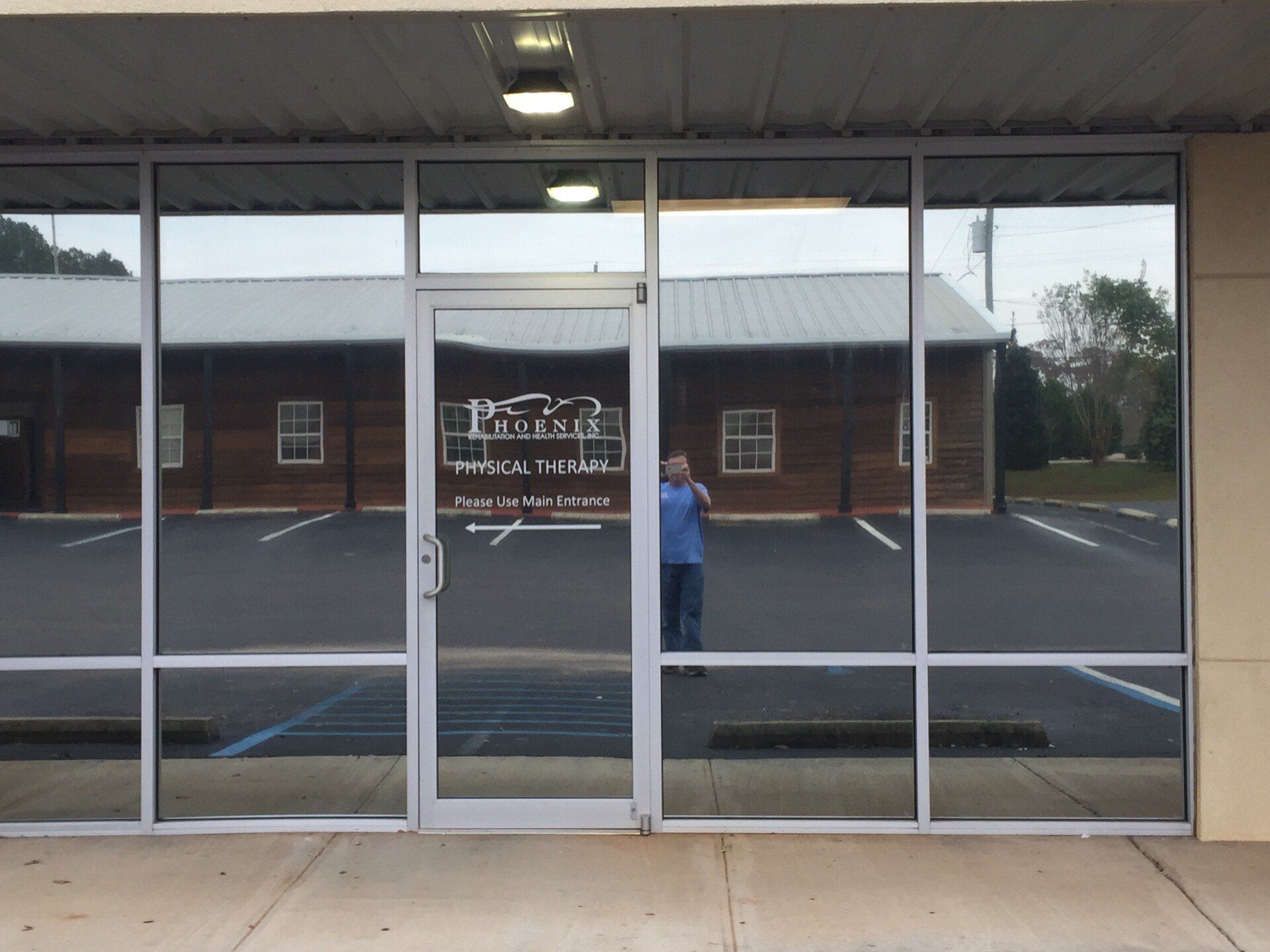 window tinting service - Storefront windows tinted adding privacy and efficiency at Phoenix Rehab, in Greenville, AL