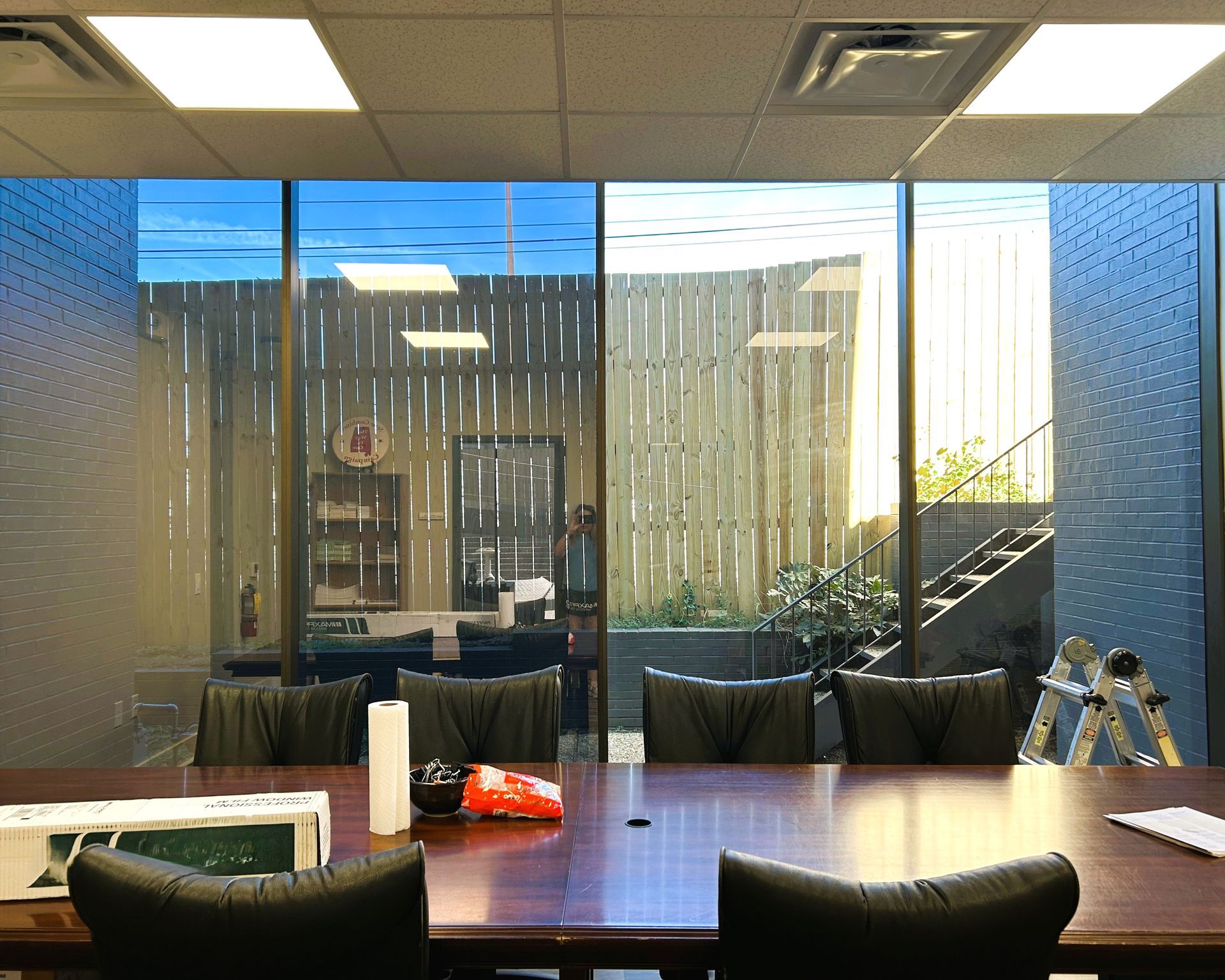 home or office window tinting - inside office windows before SPF Tint reduces distractions blocking UV Sun glare. Montgomery AL.