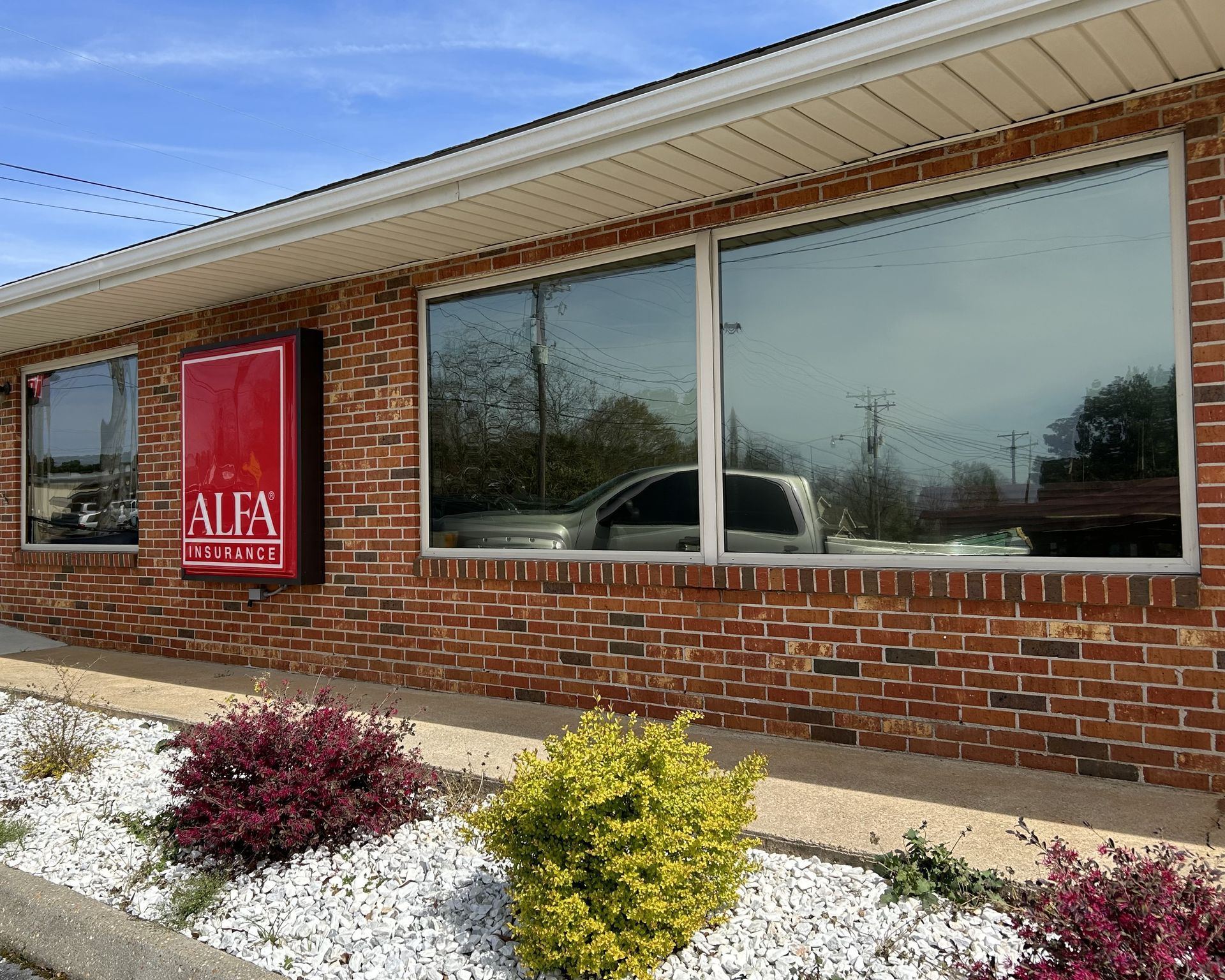 spf ultra tint stops heat and bright Sun from entering storefront windows in Troy AL
