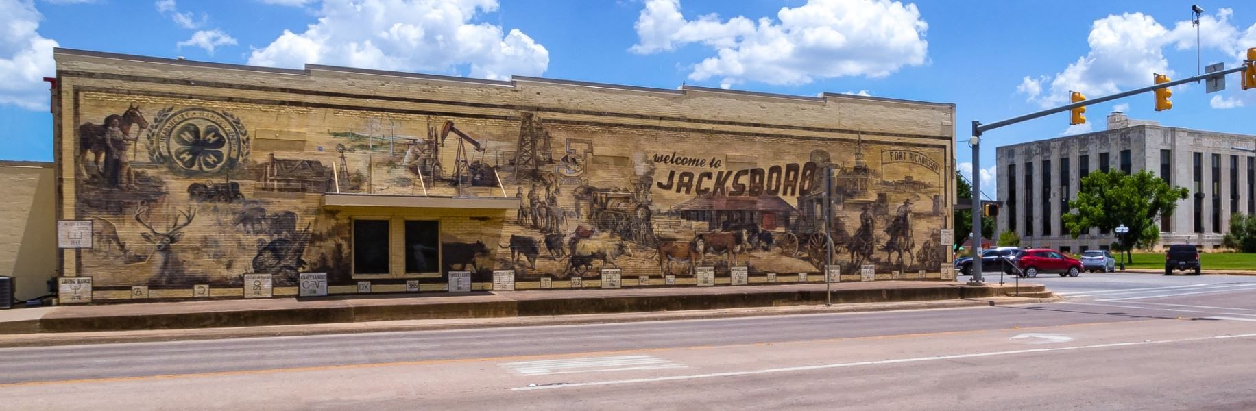 A large mural on the side of a building says jackson
