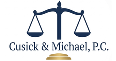Cusick & Michael, P.C. logo with navy scales of justice and gold base on white background