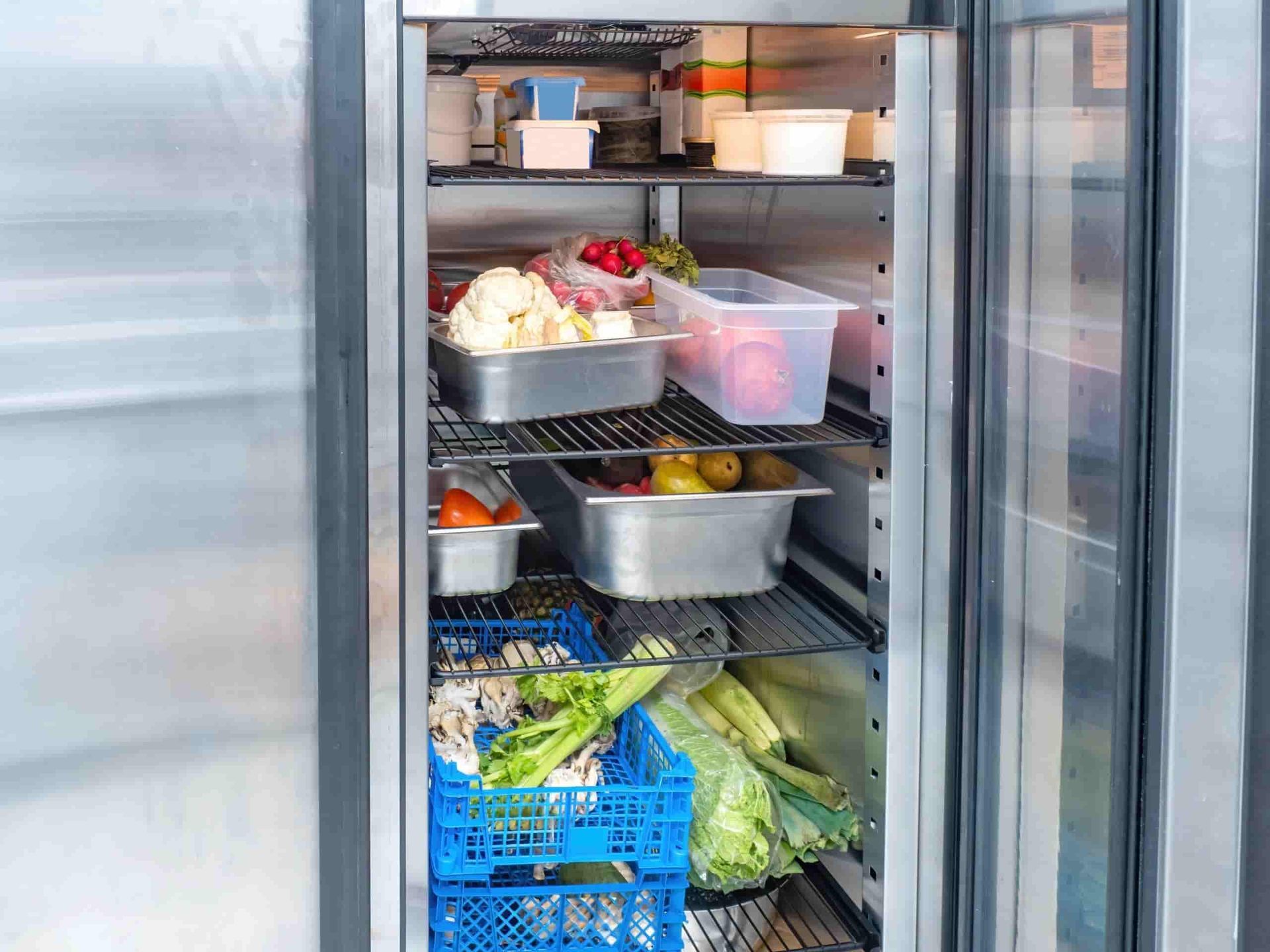 A Stainless Steel Refrigerator Filled With Fruits and Vegetables — Refrigerated Technologies (QLD) Pty Ltd In Bowen, QLD