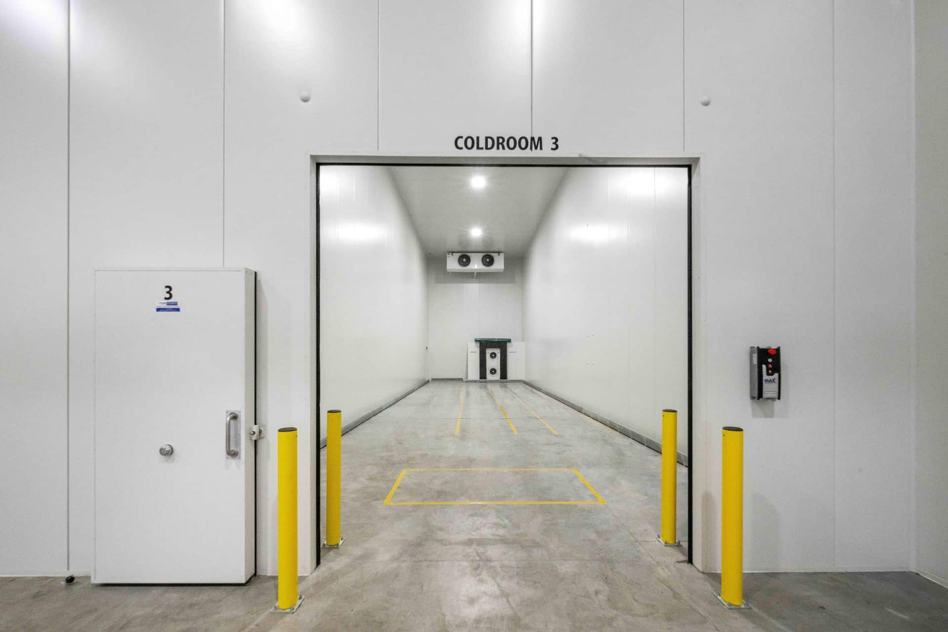 A Large White Door is Open in a Warehouse — Refrigerated Technologies (QLD) Pty Ltd In Bowen, QLD
